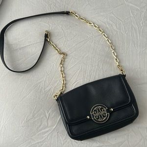 black TORY BURCH CROSSBODY. worn a few times. Leather in good condition.